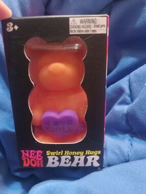 NIB Nee Doh Swirl Honey Hugs Bear Orange